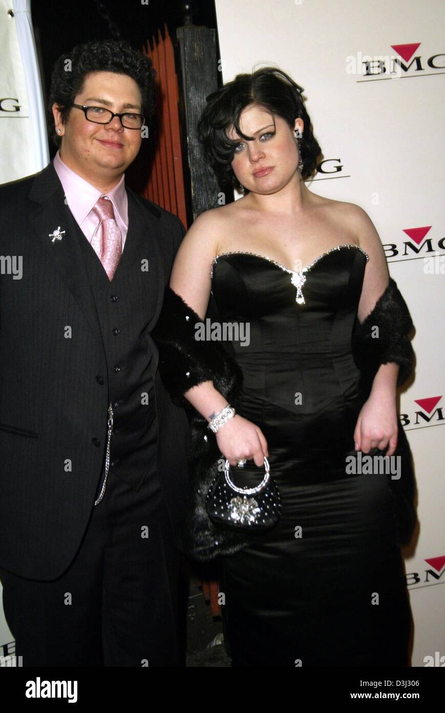 (dpa) - Pop singer Kelly Osbourne and her brother Jack smile and pose on their arrival at the after party of the Grammy Award in Hollywood, California, 8 February 2004. Stock Photo