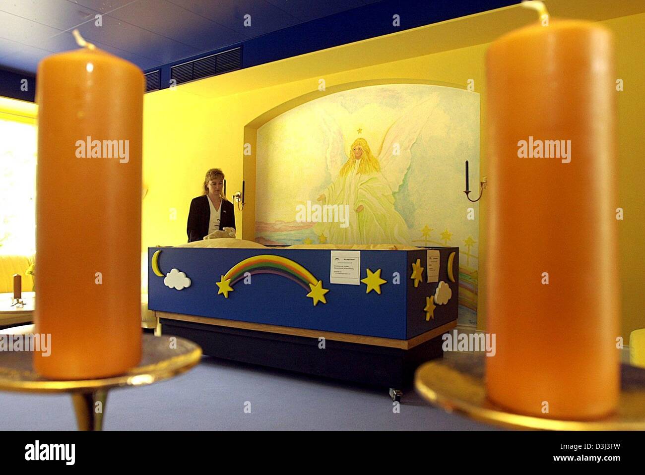 (dpa) - An employee stands next to the bed in the 'leave-taking room' of the hospice for terminally ill children in Hamburg, Germany, 17 May 2003. It is the first hospice for children in northern Germany. Stock Photo