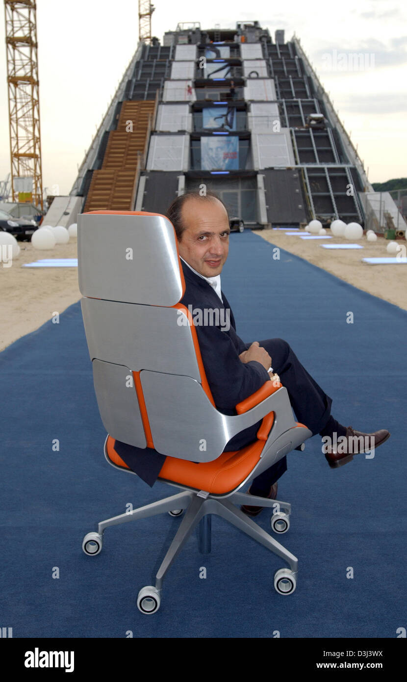 dpa) - Star architect Hadi Teherani sits in his freshly designed office  chair 'Silver' in Hamburg, Germany, 16 June 2005. In the evening, Teherani  presented the chair to an audience of 500