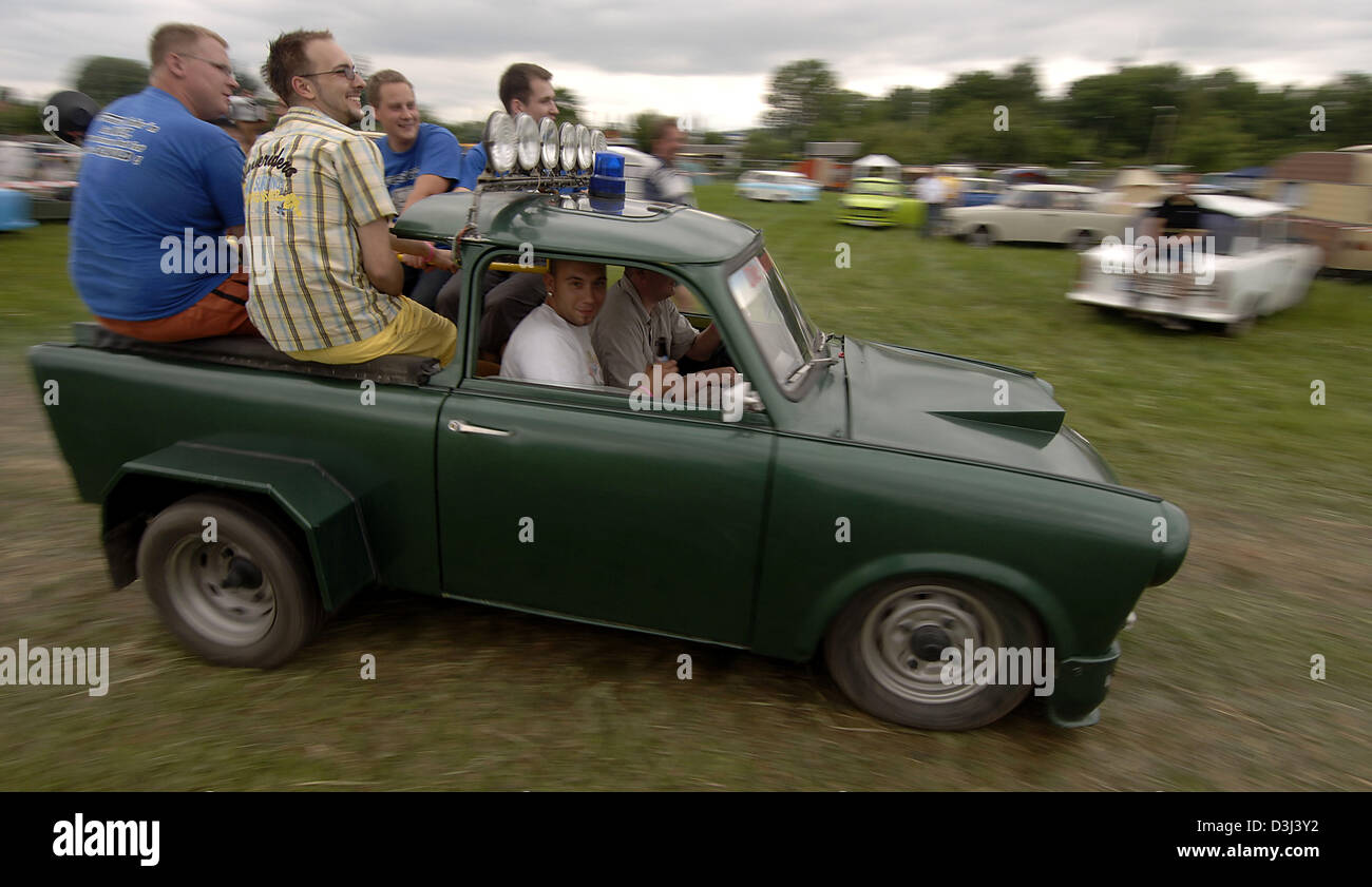 Six 'Trabi' fans drive around in a Trabant pickup at the former airport in  Zwickau, Germany, Friday 17 June 2005. From 17th June to 19th June 2005  Zwickau hosts the 12th International