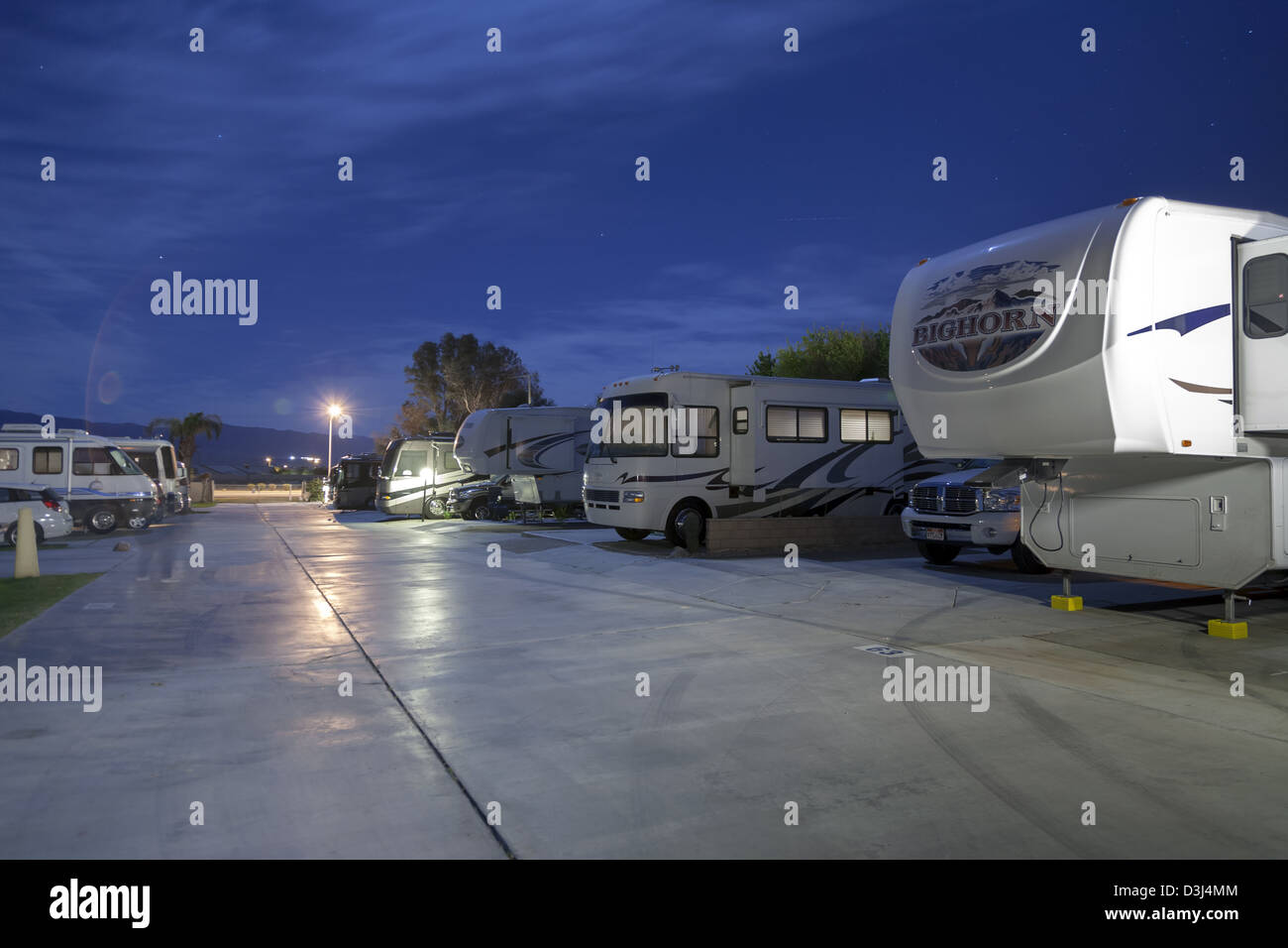 Moonlit view of recreational vehicles in a RV park in Indio California USA Stock Photo