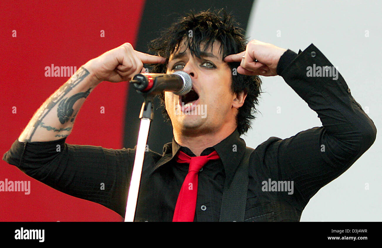 (dpa) - Singer Billie Joe Armstrong of the US American band Green Day  performs on the 'centerstage' in Nuremberg, Germany, Saturday 04 June 2005. This weekend the German rock scene will be drawn to the Eifel and Franconia. The twin music festivals in Nuremberg and at the Nuerburgring boast more than 90 German and international bands featuring the whole  spectrum of rock until its  Stock Photo