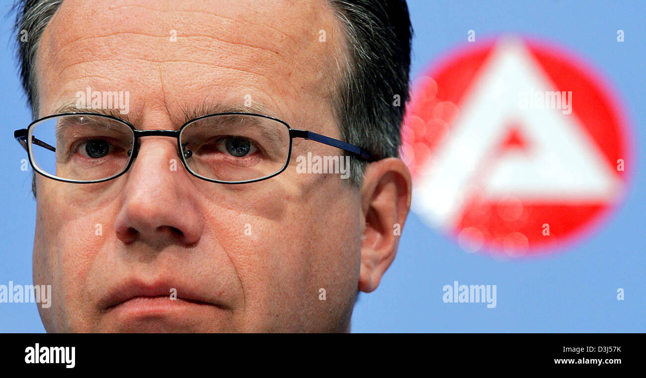 (dpa) - The chairman of the Federal Employment Agency (FEA), Frank-Juergen Weise, speaks at a press conference in front of the new FEA logo in Nuremberg, Germany, 31 May 2005. Weise presents the unemployment stats for May 2005. Stock Photo