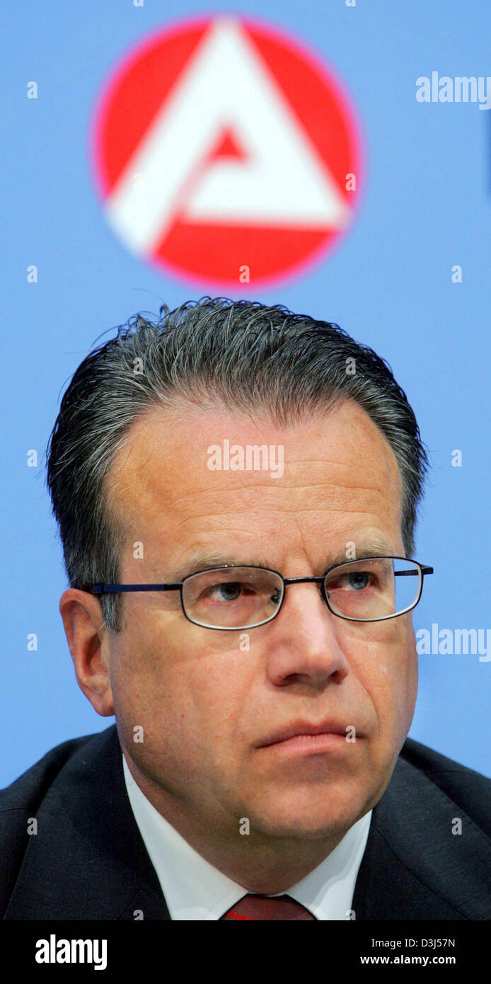 (dpa) - The chairman of the Federal Employment Agency (FEA), Frank-Juergen Weise, speaks at a press conference in front of the new FEA logo in Nuremberg, Germany, 31 May 2005. Weise presents the unemployment stats for May 2005. Stock Photo