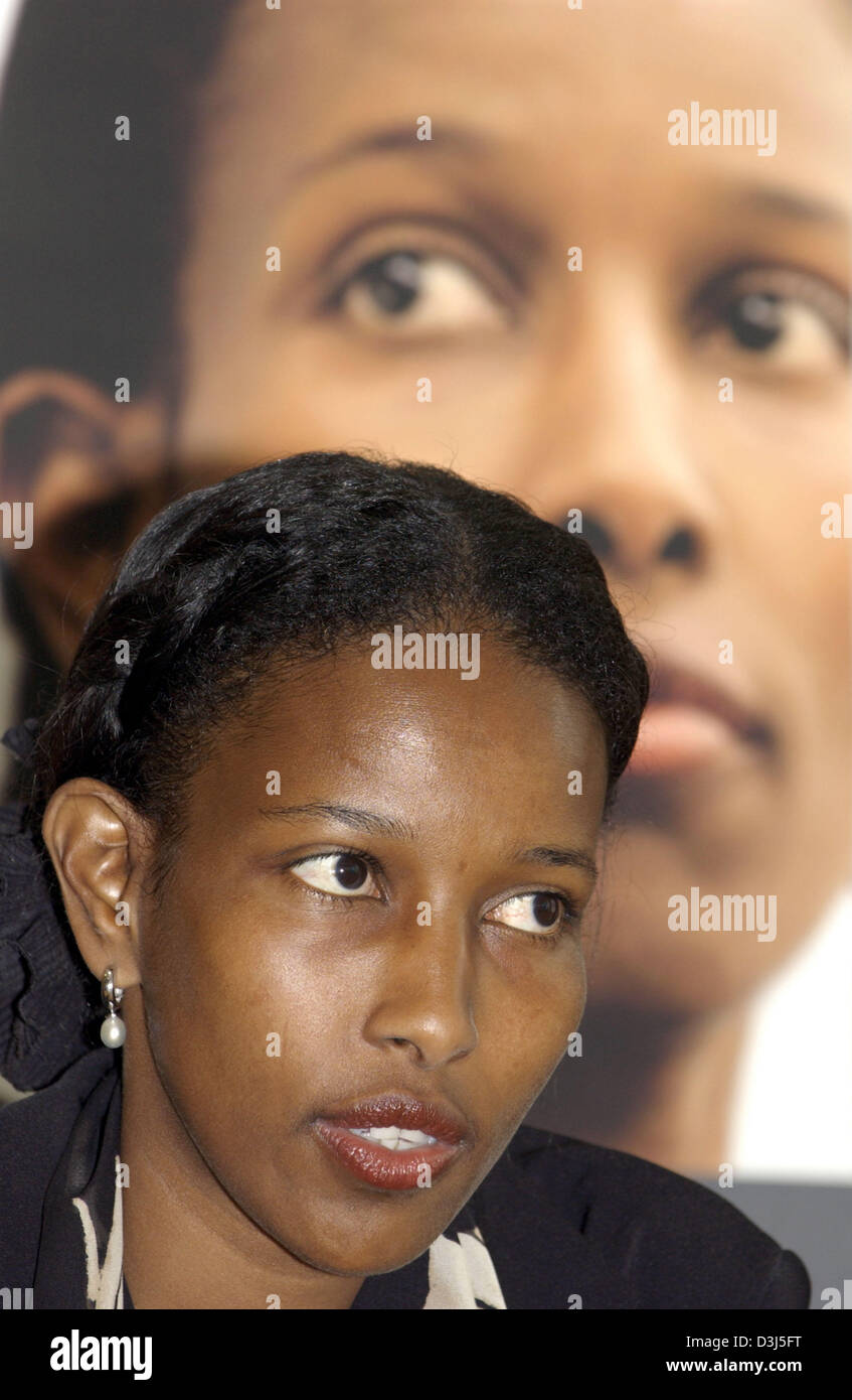 (dpa) - Women's activist Ayaan Hirsi smiles during the introduction of her book 'Ich klage an' (I accuse) at a press conference in Berlin, Germany, Monday 30 May 2005. Born in Somalia 35-year-old Hirsi lives now in the Netherlands. By writing books about suppressed women Hirsi fights for the rights of Muslim women. Hirsi was voted by Time Magazine as one of the 100 most influential Stock Photo