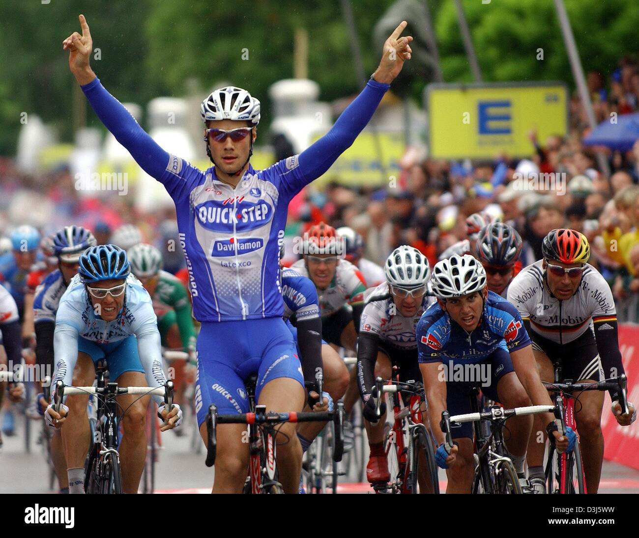 (dpa) - Belgian cyclist Tom Boonen (team Quickstep Davitamon) celebrates after winning the second stage of the Tour of Germany cycling race in Wangen im Allgaeu, Germany, Tuesday, 1 June 2004. The seven stage long tour totals 1,095.7 km and leads from Karlsruhe to Leipzig. Stock Photo