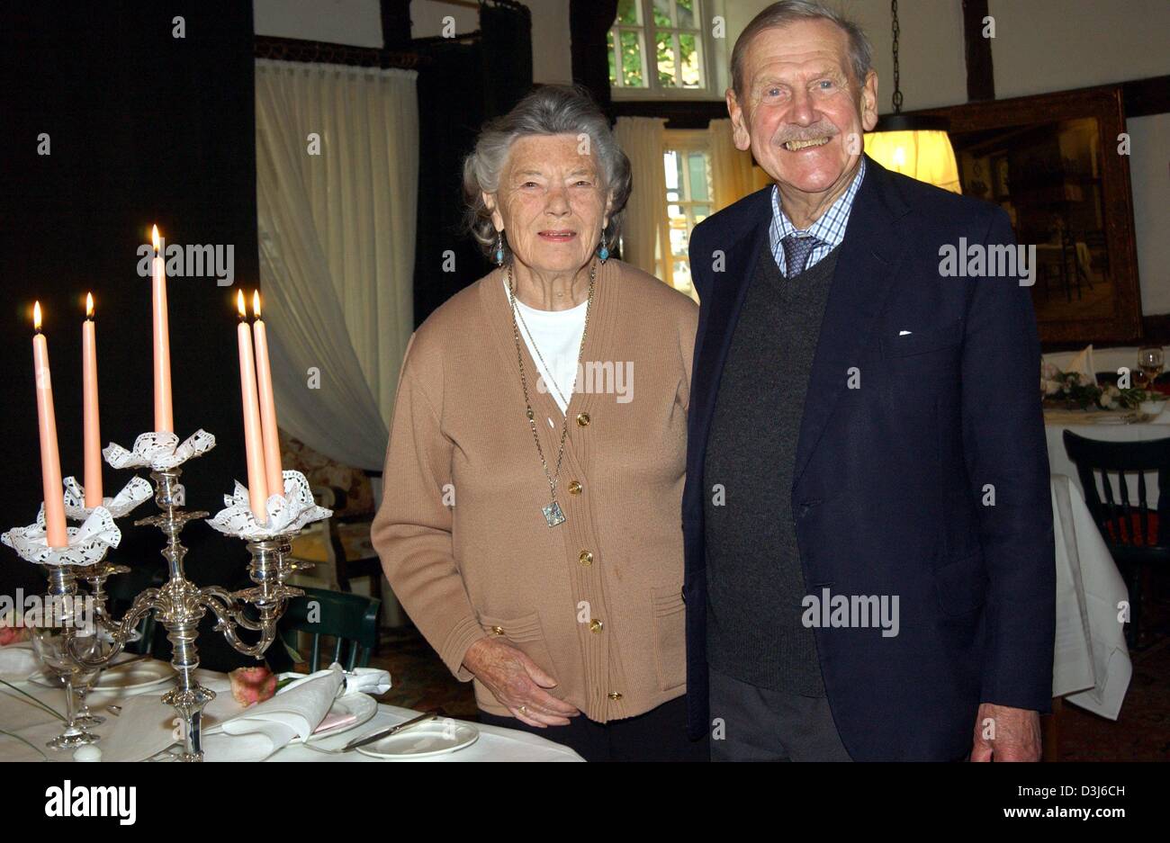 (dpa) - British bestselling author Rosamunde Pilcher and her husband Graham visit Hohenlimburg Castle in Hagen-Hohenlimburg, western Germany, 21 May 2004. Pilcher, who became world famous with works such as 'The Shell Seekers', 'Winter Solstice' and 'September' is currently in Germany on the occasion of the opening of a culture and garden festival and to pay a visit to her niece wh Stock Photo