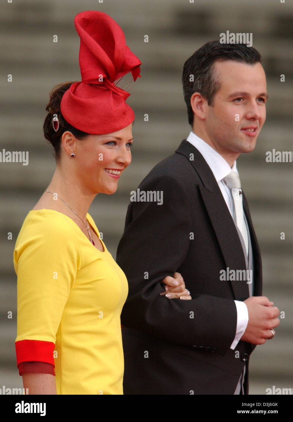 (dpa) - Princess Maertha-Louise of Norway (L) and husband Ari Behn smile as they arrive at the Almudena Cathedral for the wedding of Spanish crown prince Felipe and Letizia Ortiz in Madrid, Spain, Saturday 22 May 2004. Stock Photo