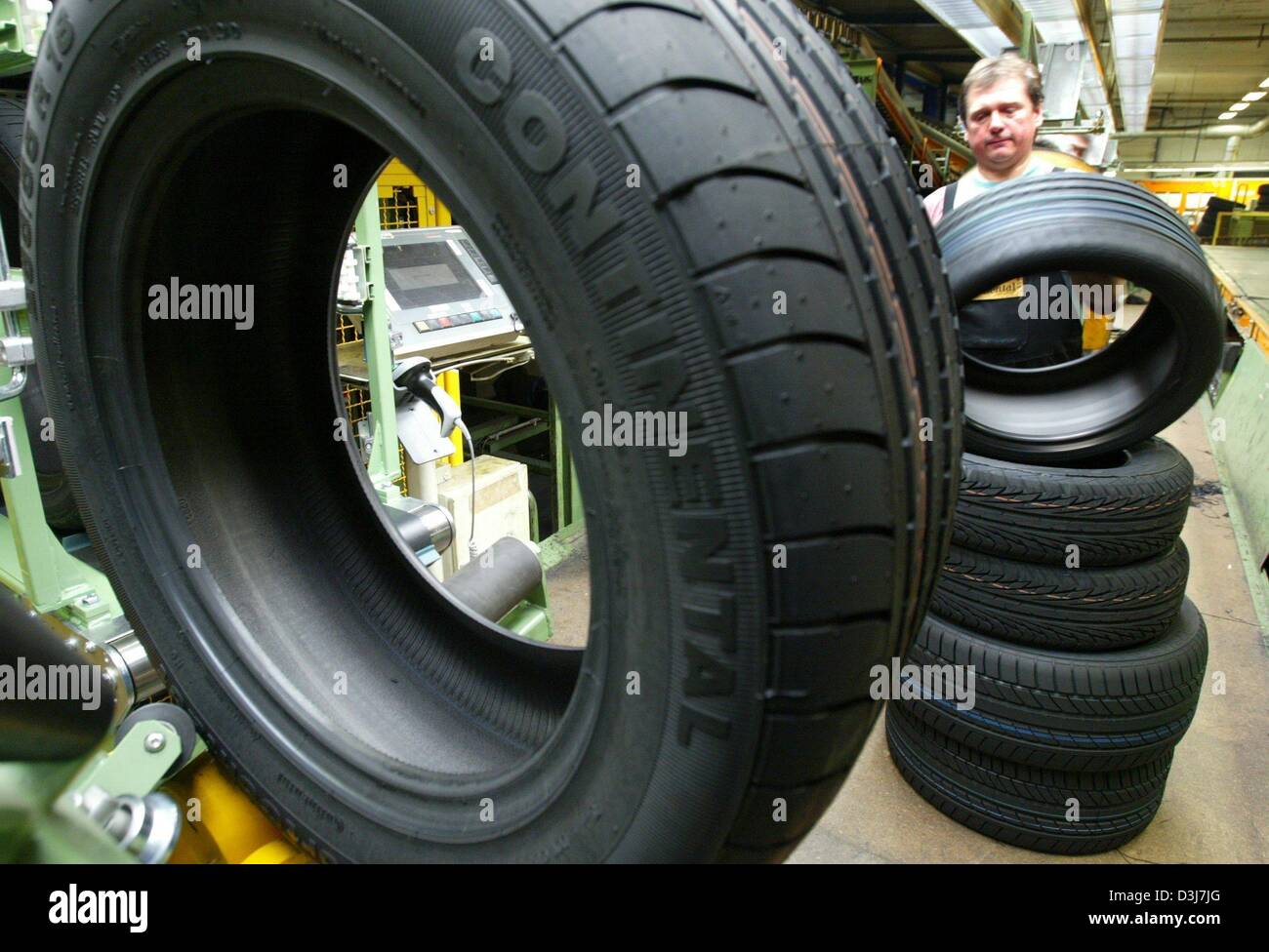 Economy business finance ebf transport tire tyre tyres factory worker