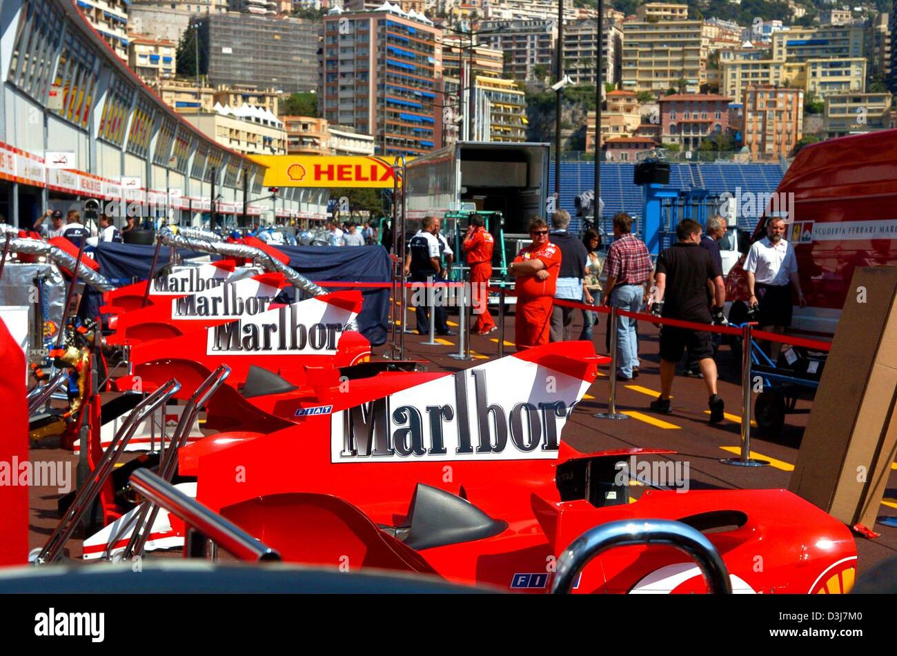 (dpa) - With hig-hrise buildings looming in the background stand the engine covers of Ferrari racecars in the new pit area at the Formula 1 city course in Monaco, Wednesday 19 May 2004. The Formula 1 Grand Prix of Monaco will be held on Sunday, 23 May 2004. Stock Photo