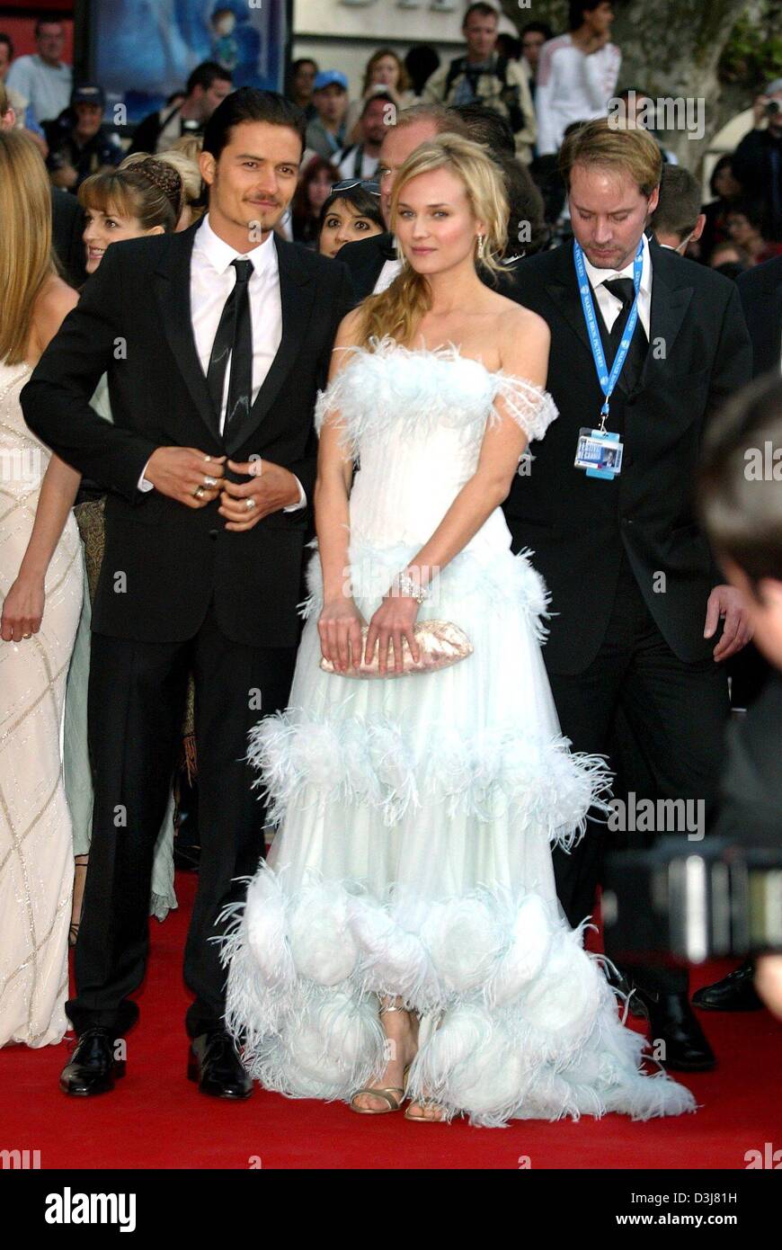 (dpa) - German actress Diane Kruger and her British colleague Orlando Bloom arrive for the presentation of their new movie 'Troy' at the 57th Film Festival in Cannes, France, 13 May 2004. In the movie Kruger stars as the beautiful Helena, Bloom plays Paris. Stock Photo