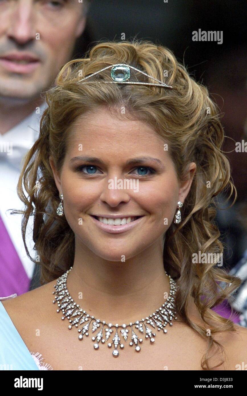 (dpa) - Swedish princess Madeleine smiles as she leaves the cathedrale after the wedding of Danish crown prince Frederik and Mary Donaldson in Copenhagen, Denmark, Friday, 14 May 2004. Members of all European royal dynasties were among the 800 invited guests who attended the wedding. Stock Photo