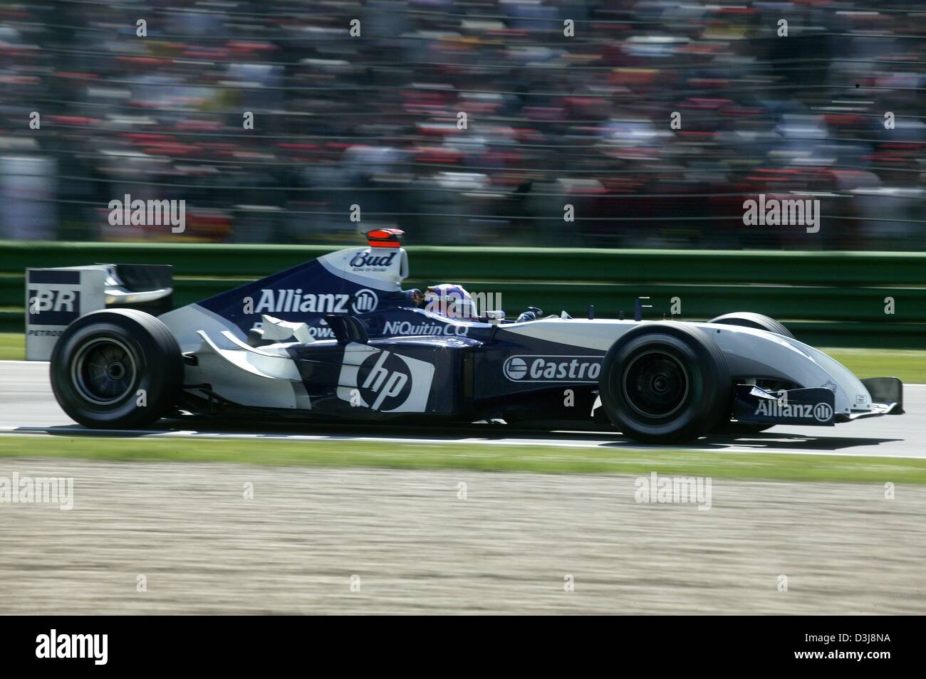(dpa) - Colombian Formula One pilot Juan Pablo Montoya races during the 2004 San Marino Grand Prix in Imola, Italy, 25 April 2004. Montoya (Team BMW-Williams) finished in third place. Stock Photo