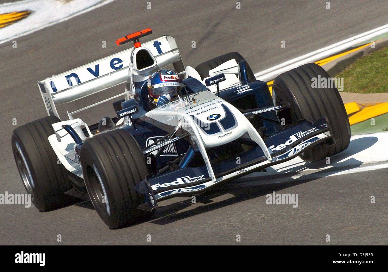 (dpa) - Colombian formula one pilot Juan Pablo Montoya races in his BMW-Williams  along the formula one circuit in Imola, Italy, 23 April 2004. Montoya drove during the free training the sixth fastest time. The San Marino grand prix starts on Sunday, 25 April 2004. Stock Photo