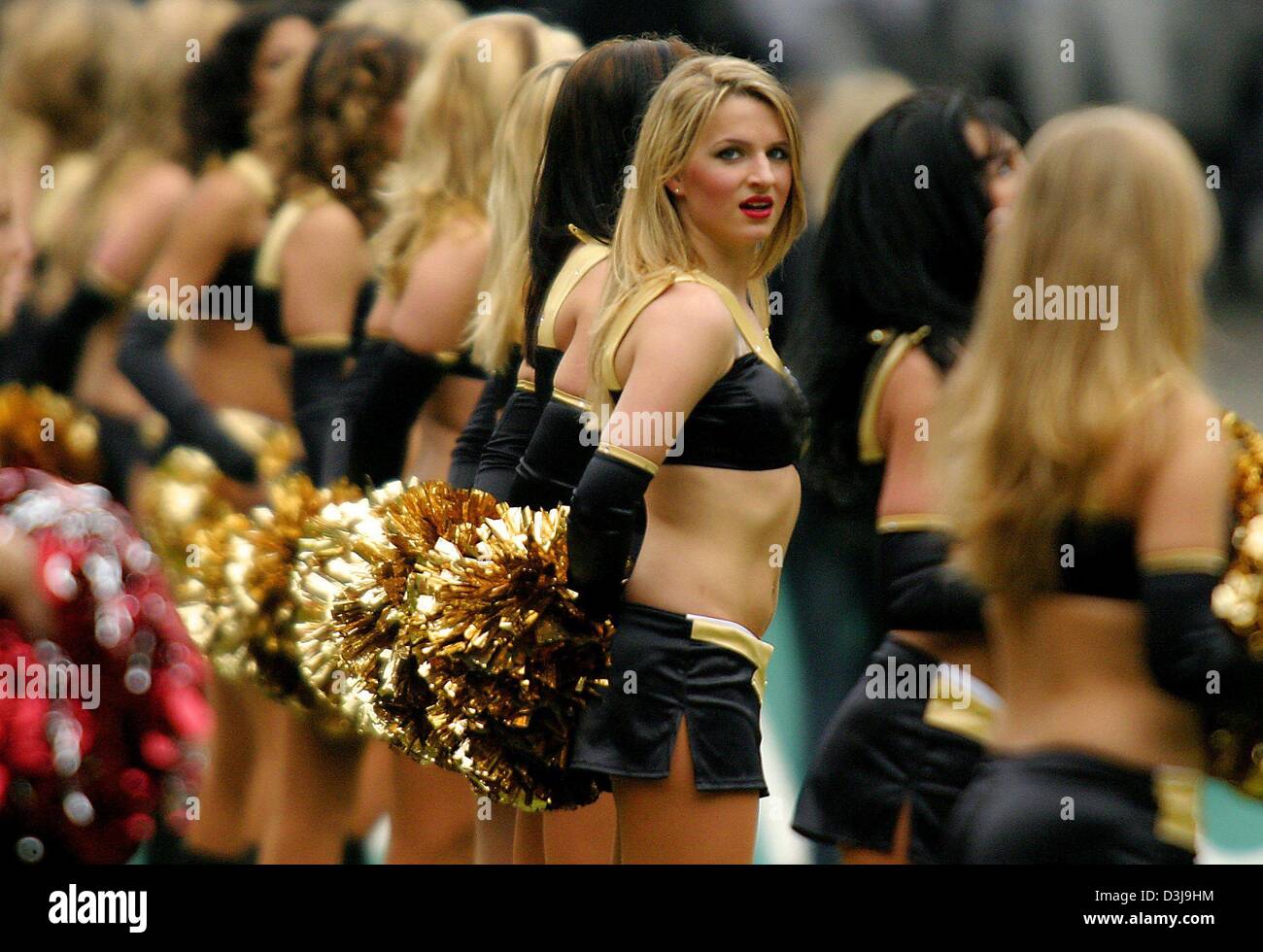 (dpa) - The cheerleaders of NFL Europe team Berlin Thunders in action during a game at Olympic Stadium in Berlin, 4 April 2004. Stock Photo