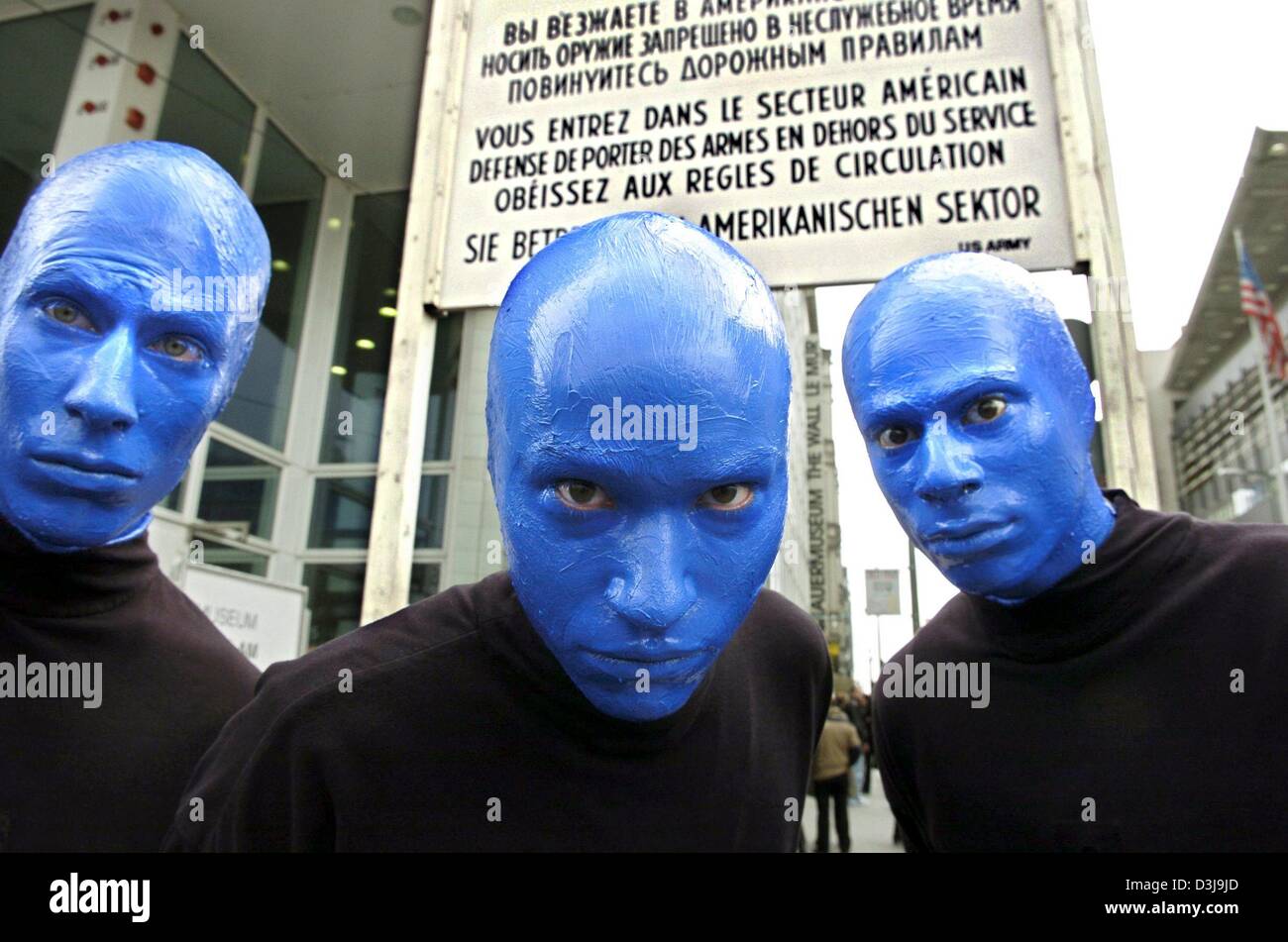 dpa three members of the blue man group pose in front of the