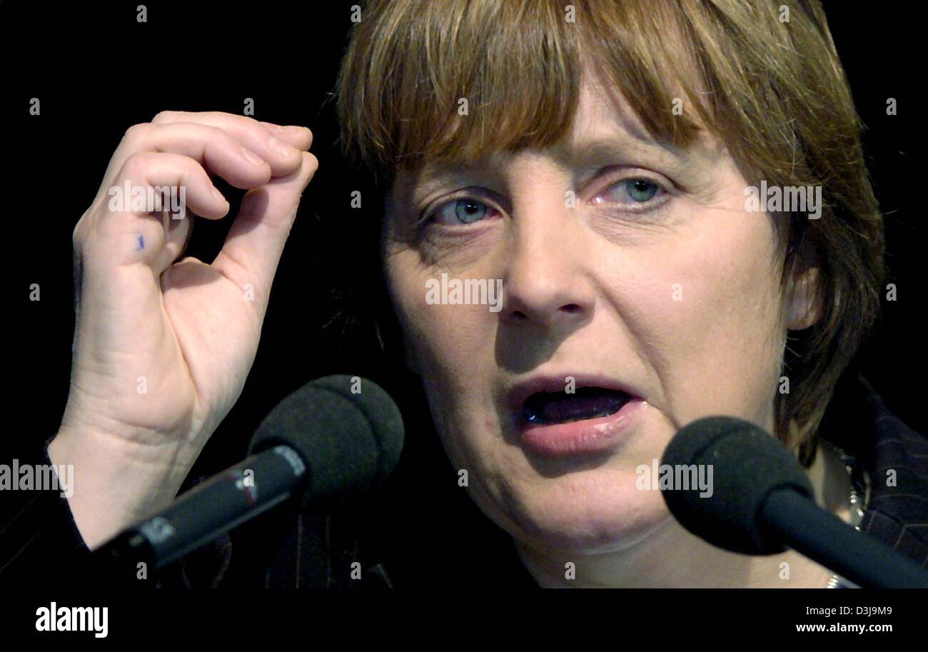 (dpa) - Angela Merkel, Chairwoman of the German Christian Democratic Party (CDU), gestures during her speech in Villingen, Germany, 27 March 2004. Stock Photo