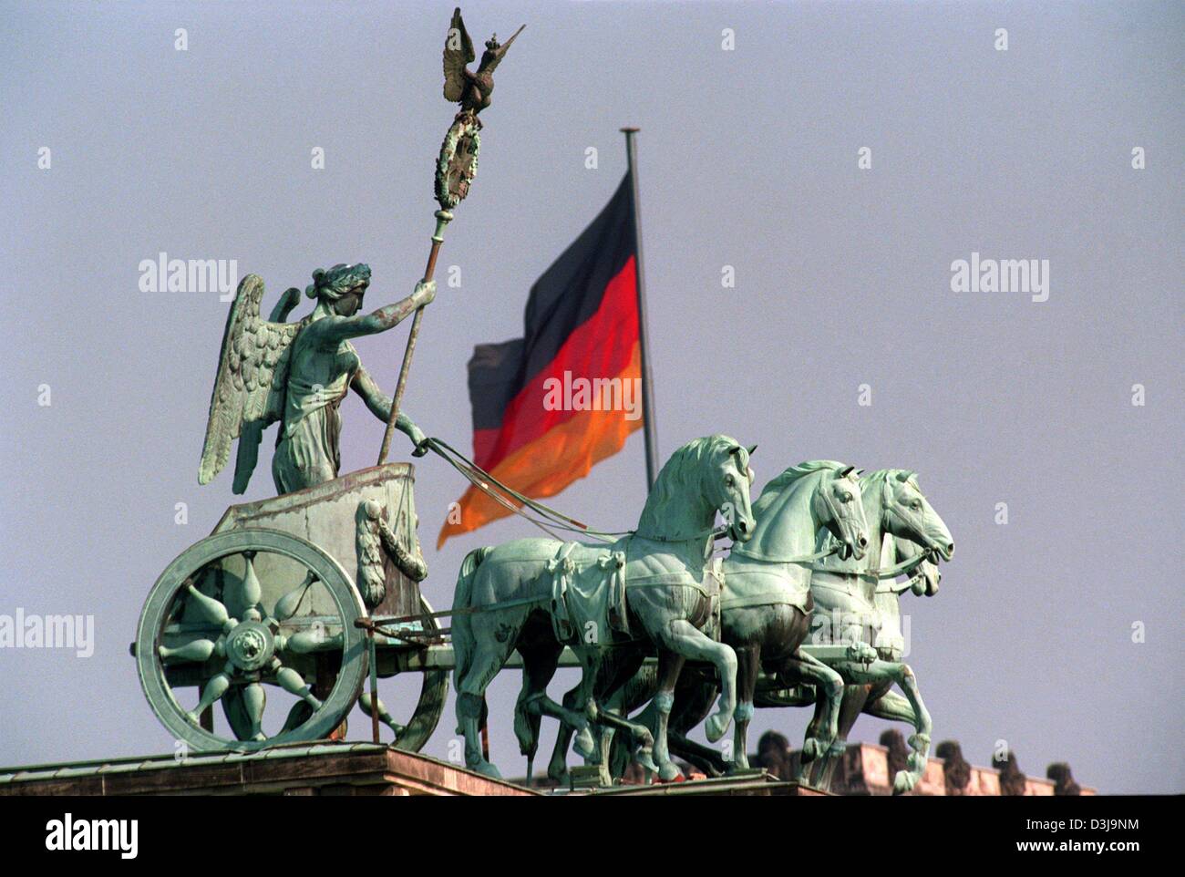 dpa files) - The restored statue of Nike, the goddess of victory, steers a  chariot with four hourses while holding the Prussian symboles, a cross and  eagle in her hand, with the