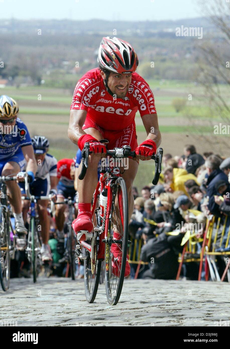dpa Italian cyclist Salvatore Commesso of Team Saeco rides his bicycle uphill during the Tour of Flanders the second race in the World Cup series near Meerbecke Belgium 4 April 2004