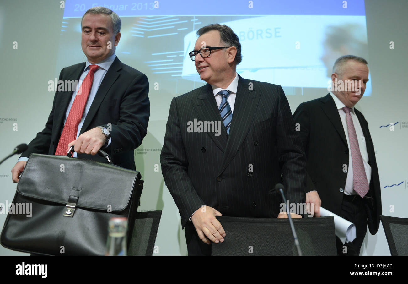 Reto Francioni (C), Deutsche Boerse Group chairman of the board, and members of the board Gregor Pottmeyer (L) and Andreas Preuss attend the financial statement press conference at the Frankfurt Stock Exchange in Frankfurt Main, Germany, 20 February 2013. Due to a smaller trading volume at the financial markets, the failed NYSE Euronext merger and the costs for staff reductions, Deutsche Boerse 2012 profits slumped by one quarter to 645 million euros. Photo: ARNE DEDERT Stock Photo