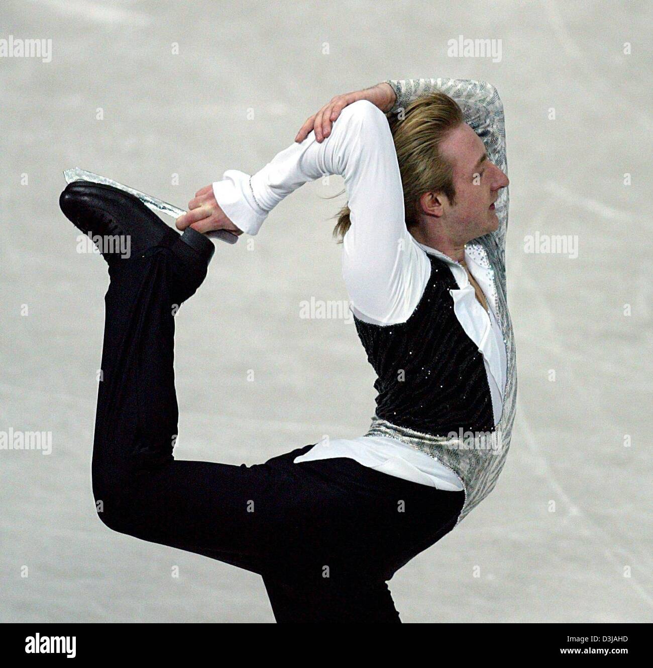 (dpa) Russian skater Evgeni Plushenko performs during the men's qualifying round of the Figure Skating World Championship in Dortmund, Germany, Monday, 22 March 2004. The world championship will last until 28 March 2004. Stock Photo