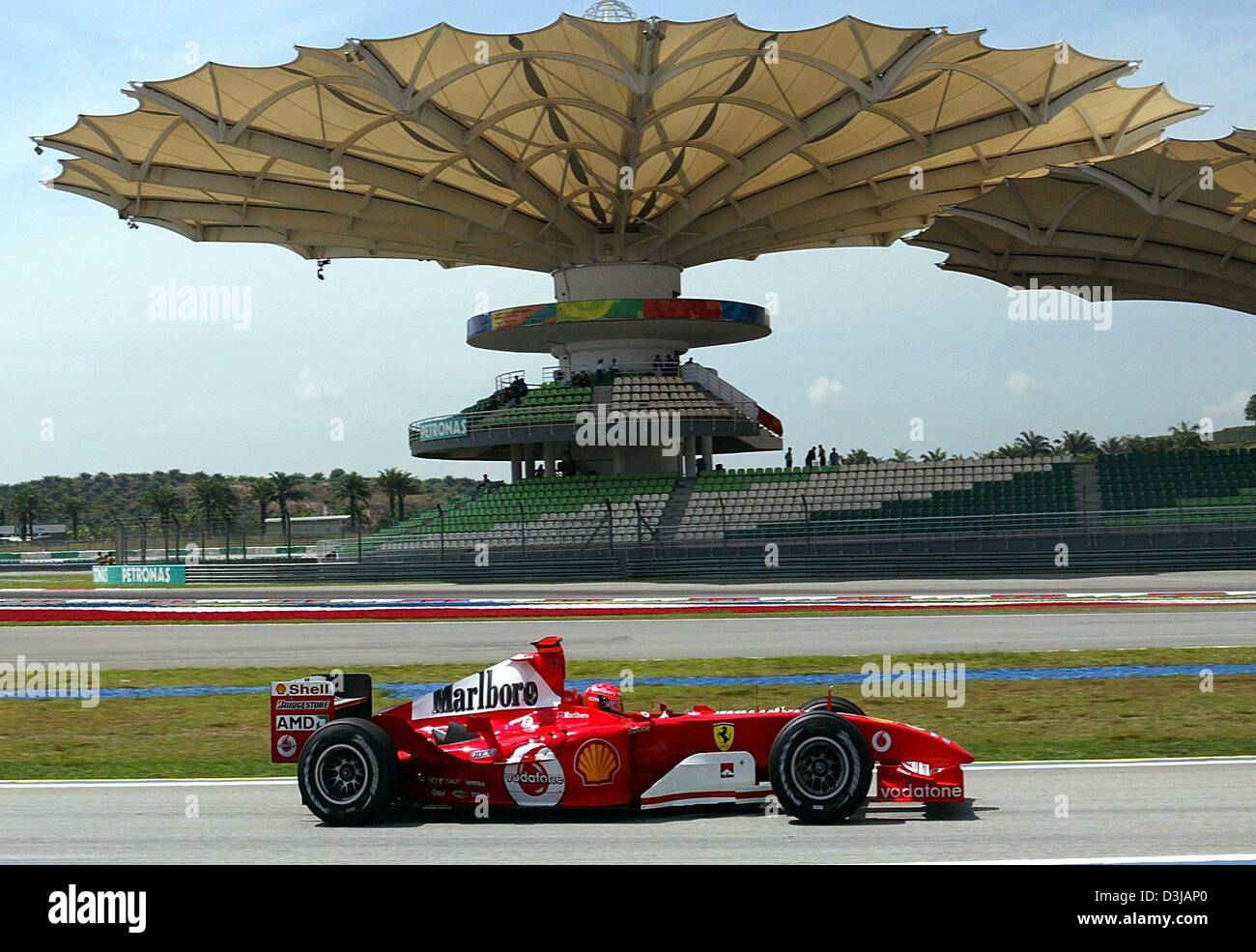 (dpa) The German F1 world champion Michael Schumacher races through the
