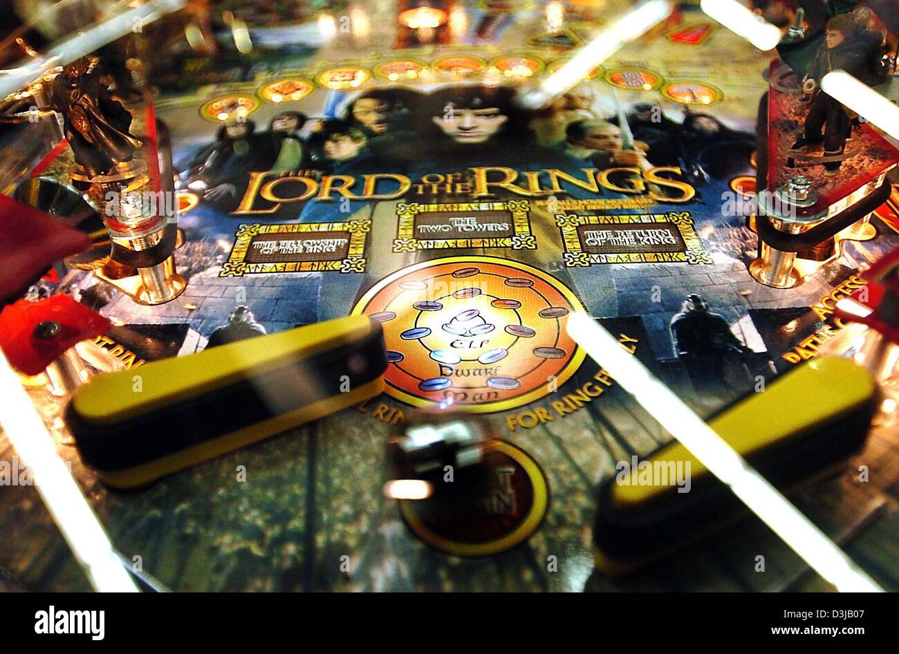 (dpa) - A flipper machine displays a design with the theme of 'The Lord of the Rings' at the 24th international fair for entertainment and vending machines (IMA) at the fair centrre in Nuremberg, Germany, 21 January 2004. The German entertainment and vending machines industry is hoping for growth in the market after a decade of massive losses in market shares. Stock Photo