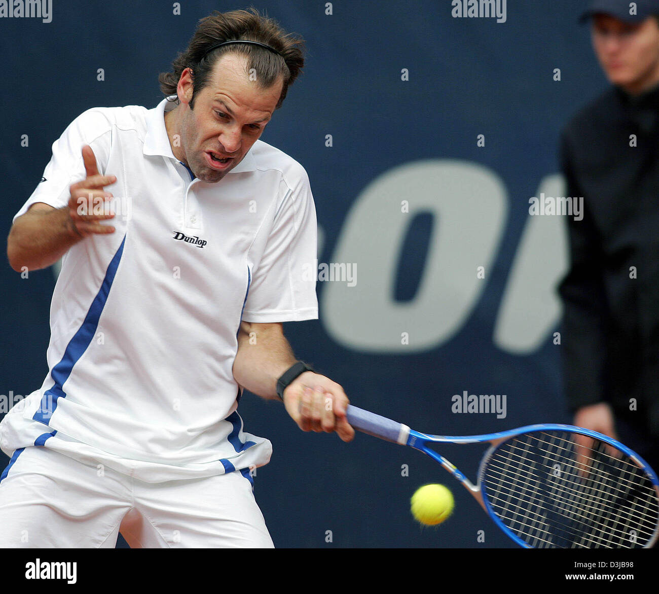 (dpa) - British tennis pro Greg Rusedski returns the ball during his first round match against German Phillip Petzschner at the Tennis Masters in Hamburg, Germany, Monday 09 May 2005. Stock Photo