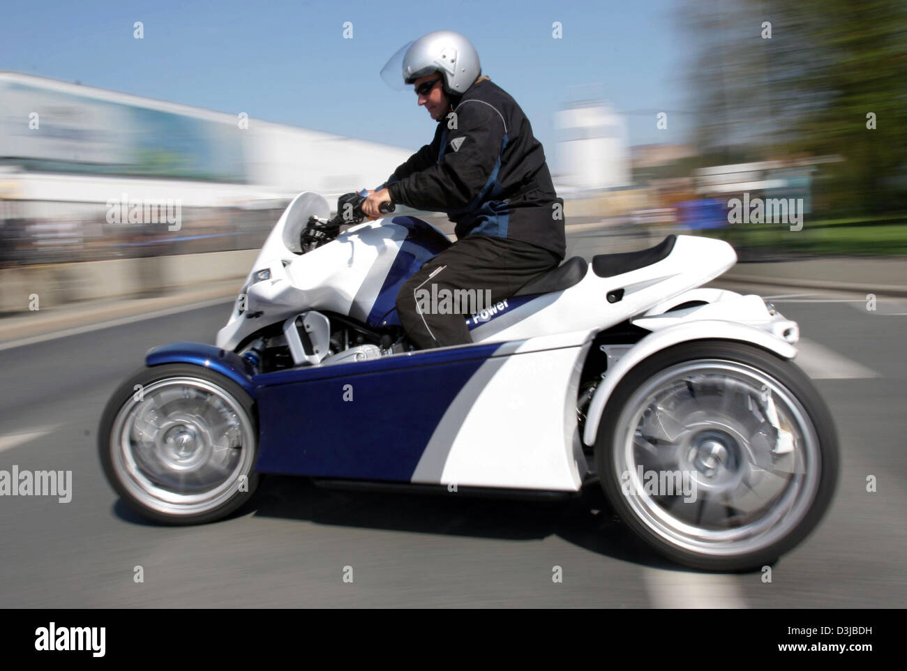 dpa) - A four wheel motor bike (quad) crosses a street in Kulmbach, Germany,  23 April 2005. The presently only German quad was constructed by Swiss  producers Grueter and Gut. (GG) using