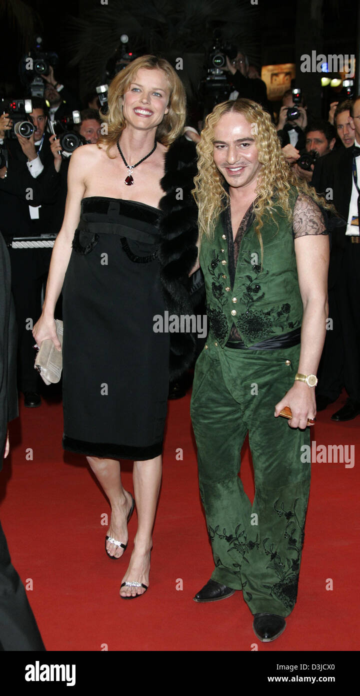 (dpa) Model Eva Herzigova (L) and designer John Galliano arrive for the premiere of the film 'Sin City' at the International Film Festival 2005 in Cannes, France, 18 May 2005. Stock Photo