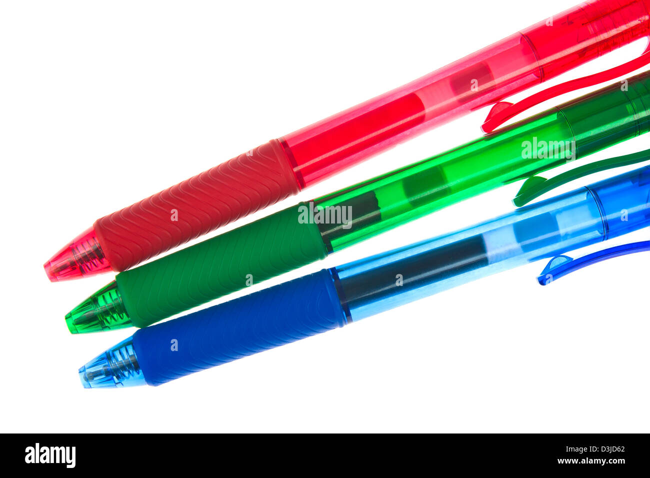 Red, green and blue ballpoint pens on white background Stock Photo
