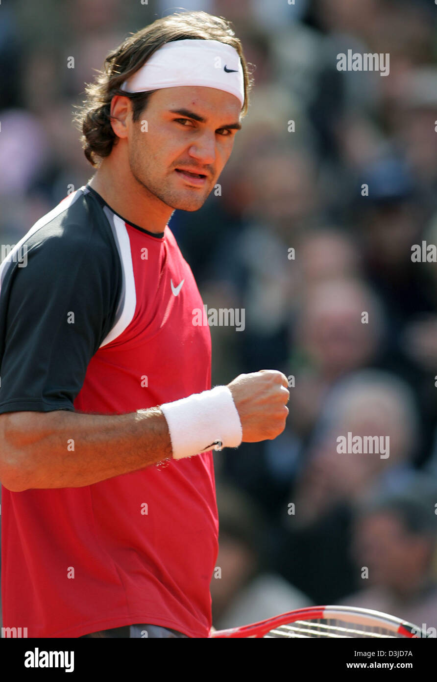 Swiss tennis pro Roger Federer strikes a pose after his two set victory against Argentinian Guillermo Coria at the ATP Tennis Masters in Hamburg, Germany, Friday 13 May 2005. Federer won the match 6-4 and 7-6. Stock Photo