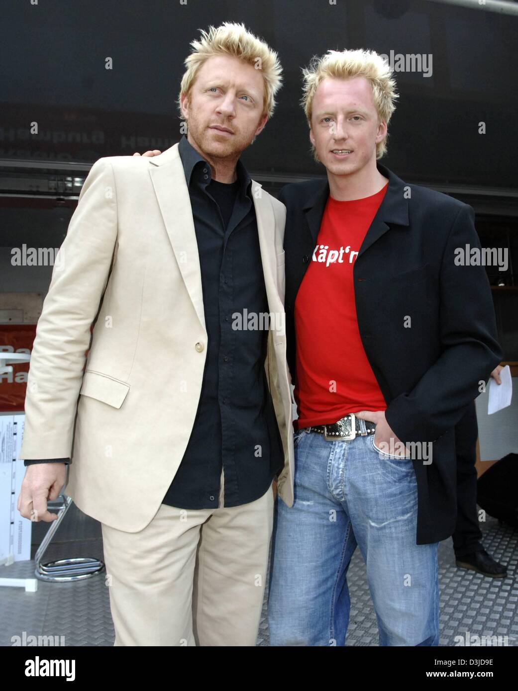 (dpa) - German tennis legend Boris Becker (L) and his look-alike Maik Lohmann pose together at the ATP Tennis Masters in Hamburg, Germany, Friday 13 May 2005. Becker is the tournament's chairman. Lohmann plays Becker's look-alike in a German TV ad. Stock Photo
