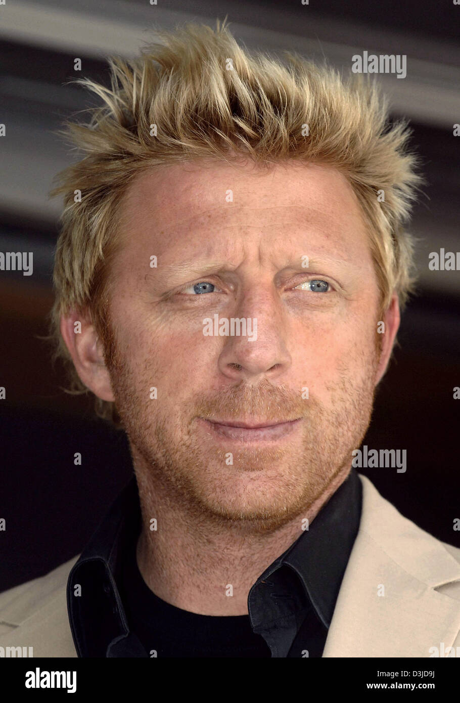(dpa) - German tennis legend Boris Becker looks curious at the ATP Tennis Masters in Hamburg, Germany, Friday 13 May 2005. Becker is the tournament's chairman. Stock Photo