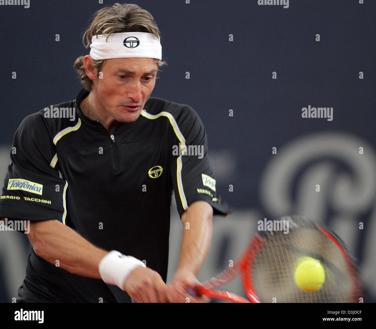 (dpa) - Unseeded Spanish tennis pro Juan Carlos Ferrero returns the ball during his match against Russian Marat Safin at the ATP Tennis Master Tournament in Hamburg, Germany, 11 May 2005. Ferrero won the match 6-4 and 6-2. Stock Photo
