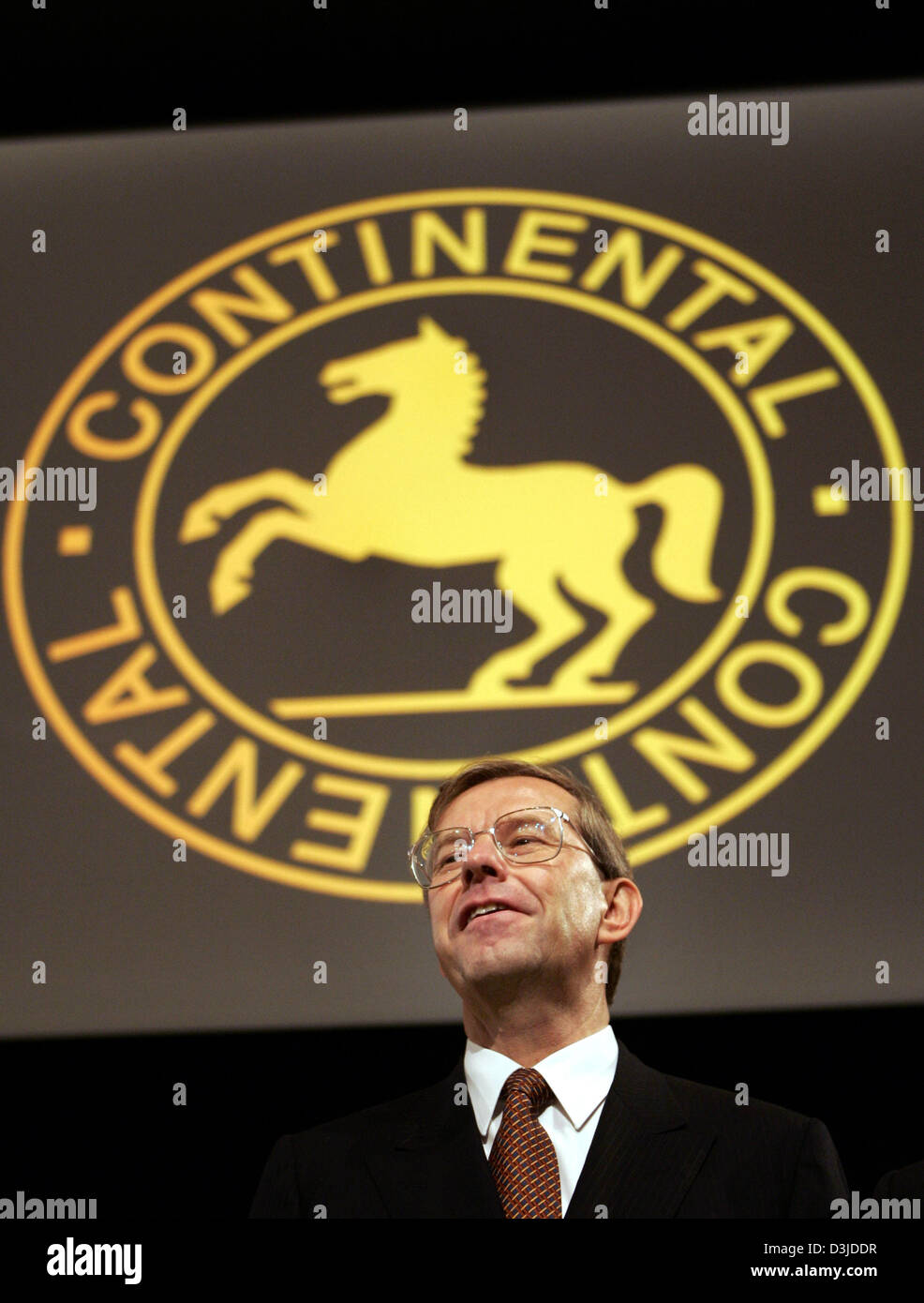 (dpa) - Continental AG CEO Manfred Wennemer stands on the podium before the company's general meeting in Hanover, Germany, 12 May 2005. Stock Photo