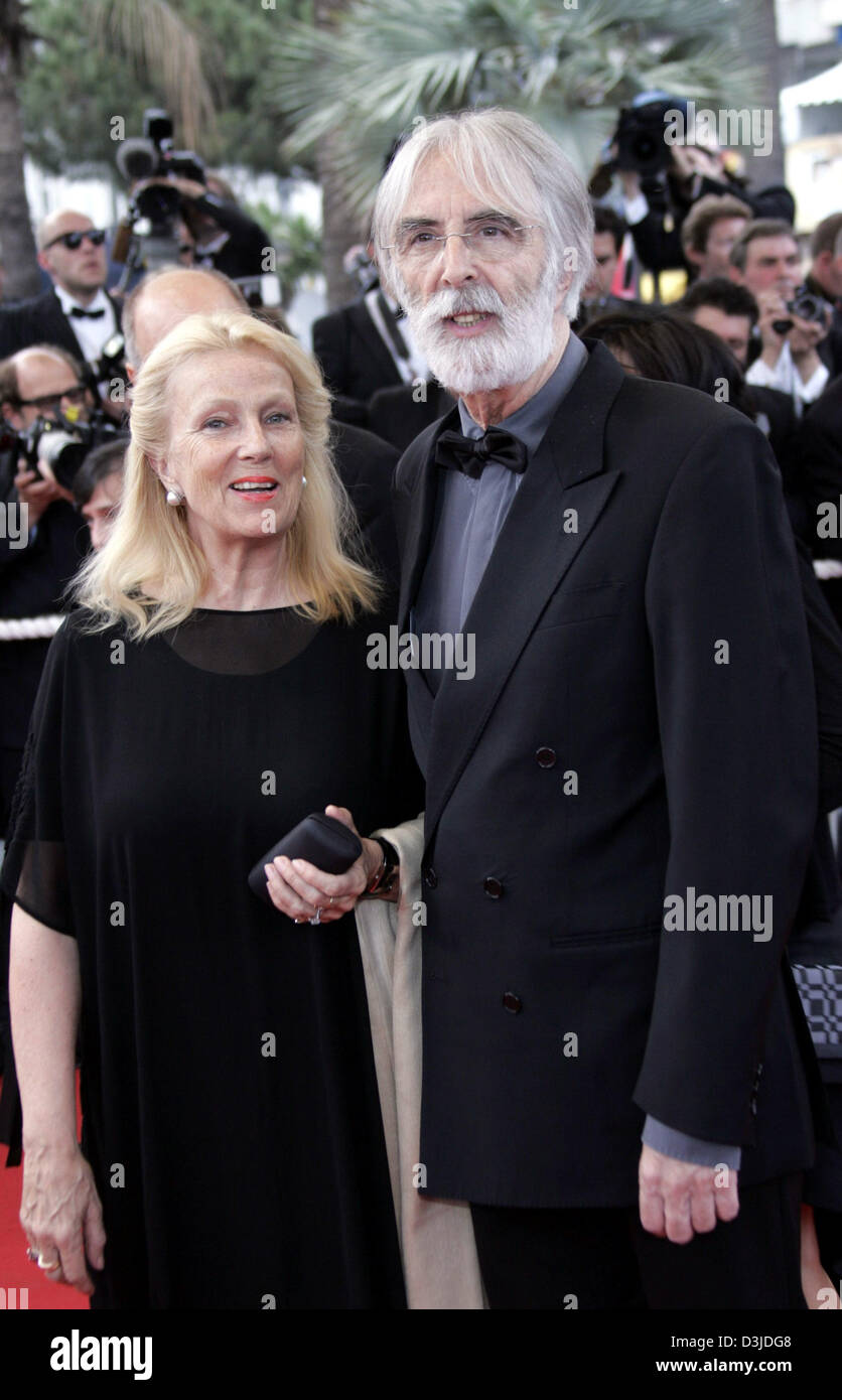 (dpa) - Austrian film director Michael Haneke (R) arrives with his wife at the 58th International Film Festival in Cannes, France, 11 May 2005. Stock Photo