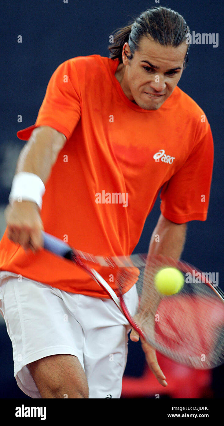 (dpa) - German tennis pro Thomas Haas plays a backhand during his first round match against Dominik Hrbaty from Slovakia at the ATP Masters in Hamburg, Germany, 10 May 2005. Haas lost the match 4-6 and 5-7. Stock Photo
