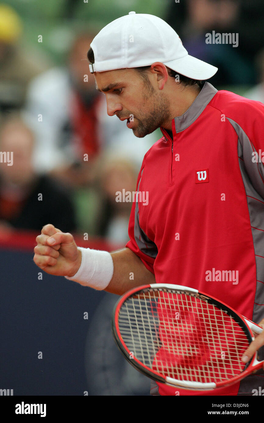 (dpa) - German tennis pro Nicolas Kiefer strikes a pose after winning a point during his match against German Philip Kohlschreiber at the Tennis Masters in Hamburg, Germany, Monday 09 May 2005. Kiefer won the match 6-4 and 6-3. Stock Photo