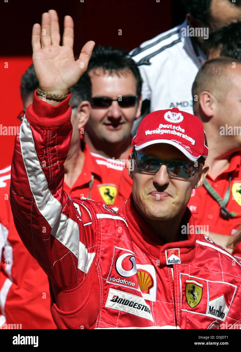 (dpa) - German Formula One Driver Michael Schumacher Of Ferrari Waves ...