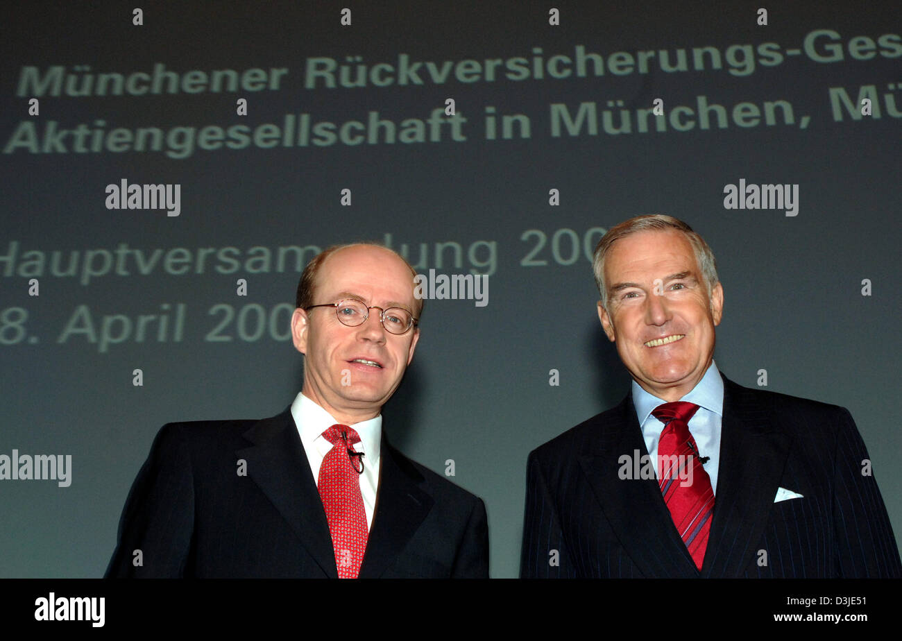 (dpa) - Nikolaus von Bomhard (L), Chairman of the worldwide largest reinsurance company Muenchner Rueckversicherungs-Gesellschaft, stands next to his predecessor and current chairman of the supervisory board, Hans-Juergen Schinzler, as they wait for the start of the general shareholders' meeting in Munich, Germany, Thursday 28 April 2005. The company is well on its way to meet its  Stock Photo