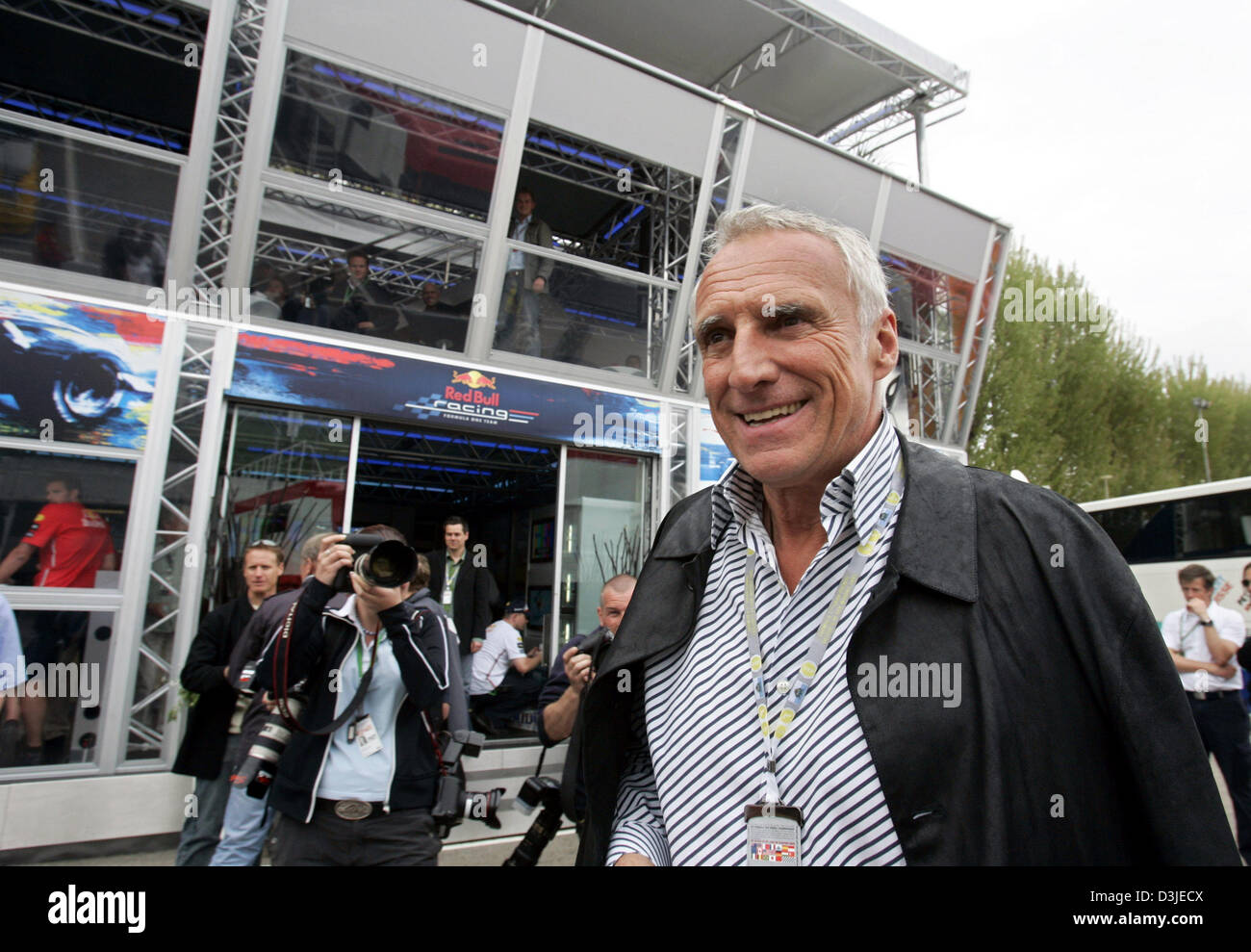 (dpa) - Austrian billionaire Dietrich Mateschitz, owner of Red Bull Formula One racing team as he walks past the new hospitality of his team in the paddock  at the Formula One racetrack in Imola, Italy, 23 April 2005. Stock Photo
