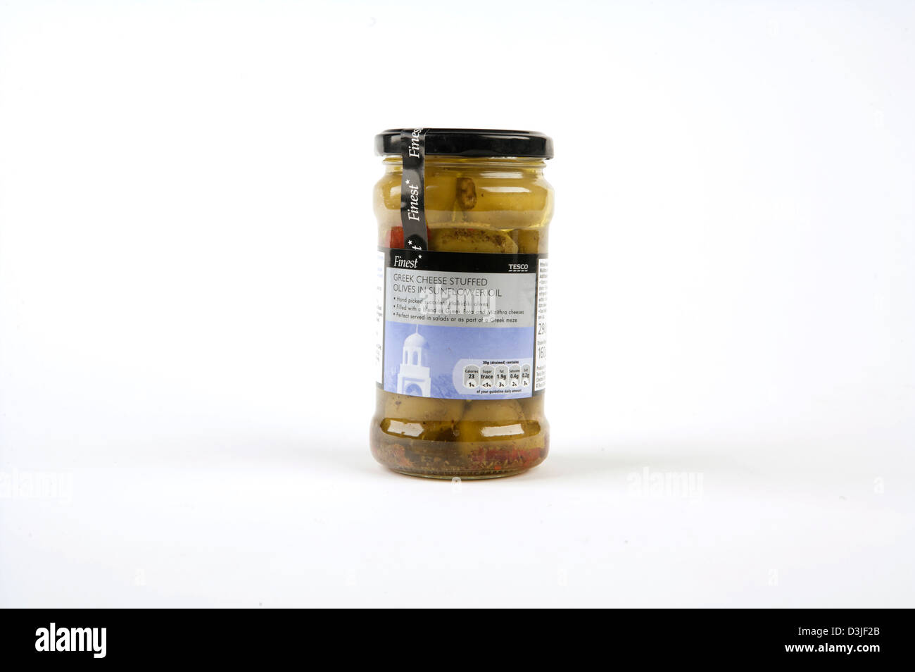 Tesco finest Olives shot in studio displayed against a white background. Stock Photo