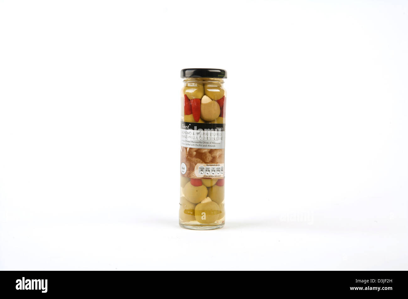 Tesco Finest Olives in a tall glass jar Stock Photo