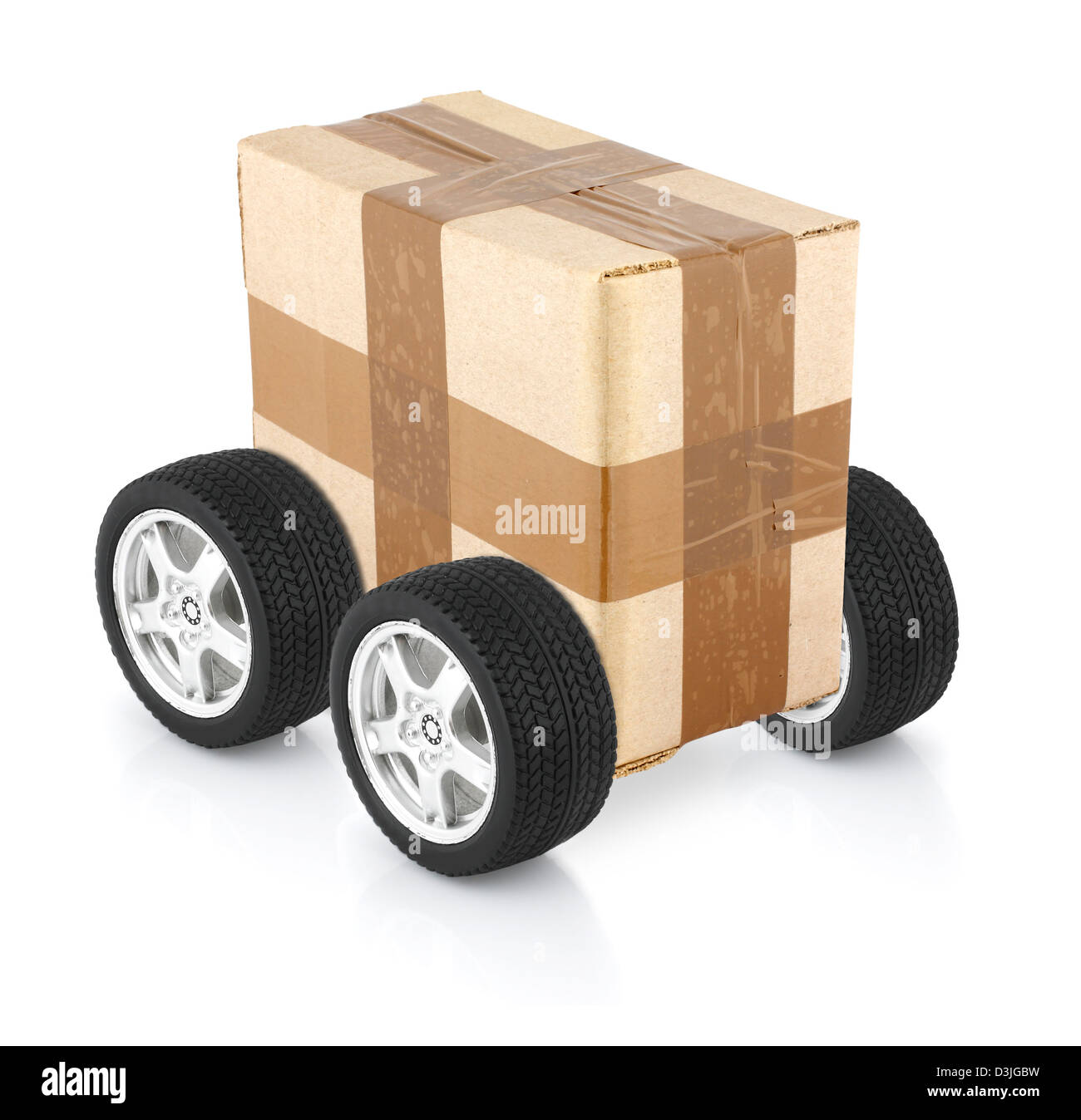 Delivery concept, Cardboard box on wheels Stock Photo