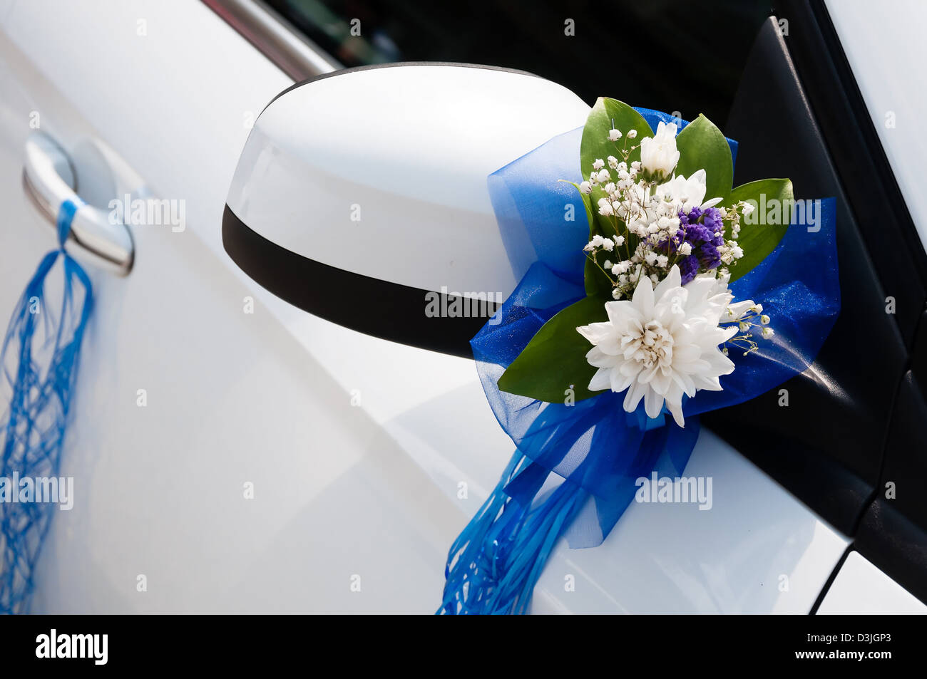 Wedding Car Decoration With Flowers And Ribbons Stock Photo