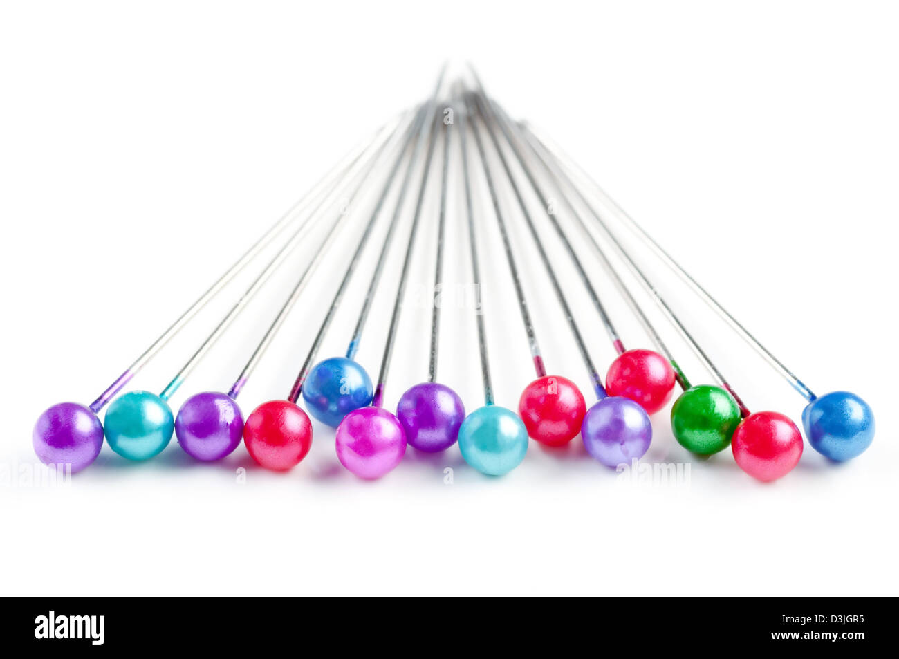 Colored sewing pins on white background Stock Photo Alamy