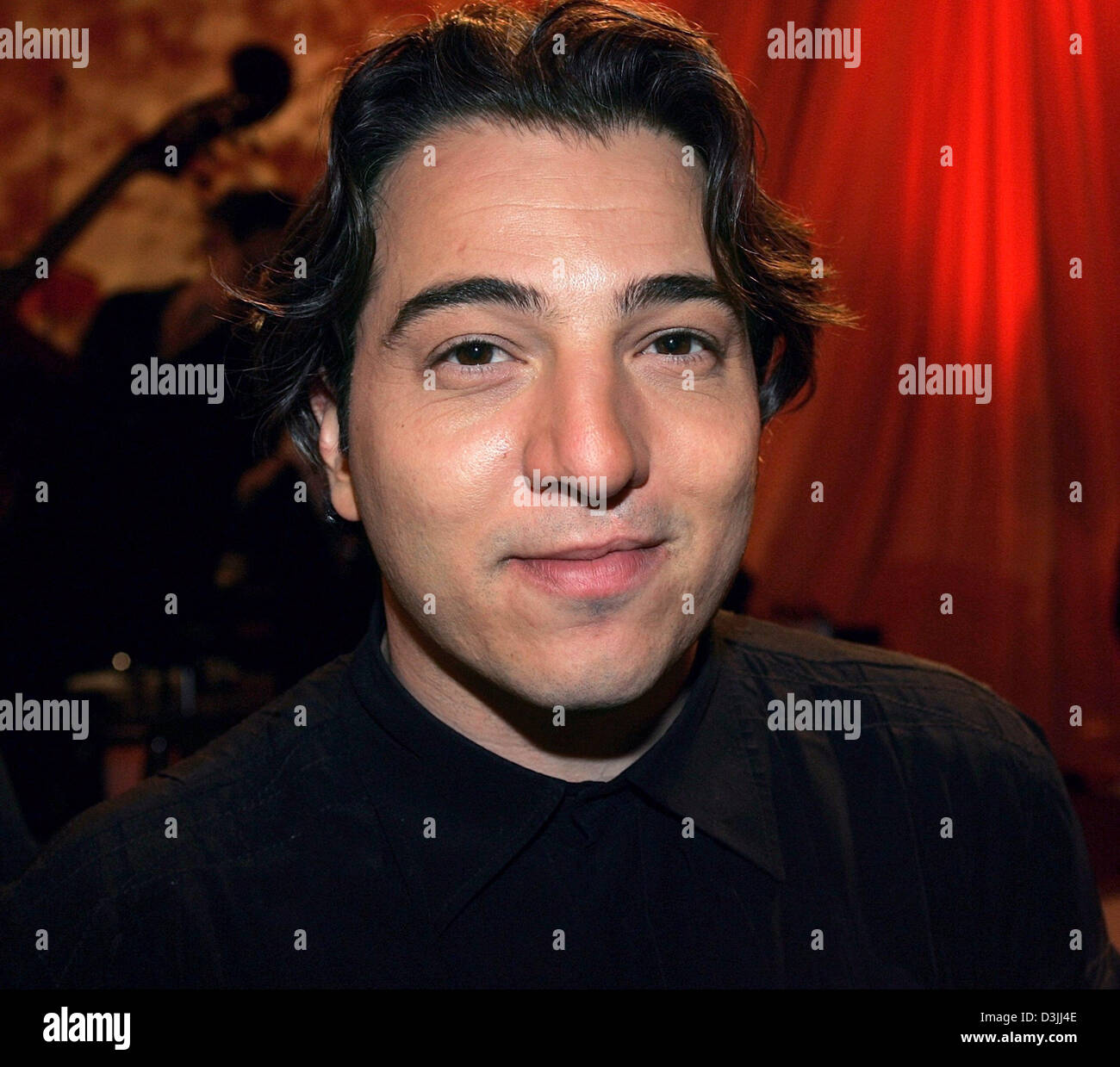 (dpa) - Turkish pianist Fazil Say posing after recording the TV programme 'Big night music' in Munich, Germany, 7 April 2005. To the show were invited classical music stars as well as pop singers, who interpret their songs symphonically. Stock Photo