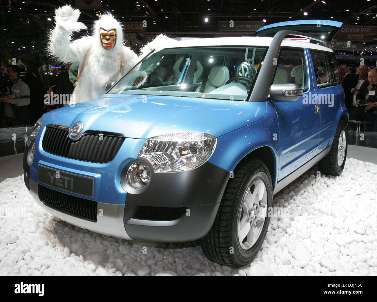 dpa) - A person dressed as a yeti poses next to the SUV concept car by Skoda  named 'Yeti' at the 'Autosalon', car exhibition, in Geneva, Switzerland,  Tuesday, 01 March 2005. Visitors