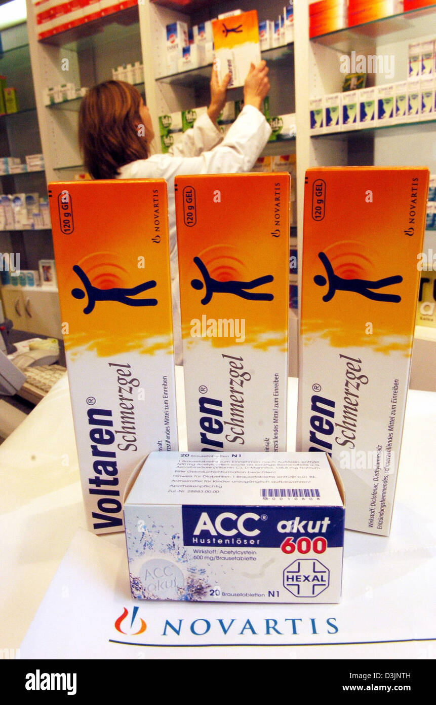 (dpa) - Picture of anti-cough medicine by Hexal and a pack of pain relief plaster from pharmaceutical giant Novartis lying next to each other on the counter of a pharmacy in Munich, Germany, 21 February 2005. Swiss pharmaceutical company Novartis will take over German generic drug manufacturer Hexal. A merger by Hexal and Novartis subsidiary company Sandoz will create the world's l Stock Photo